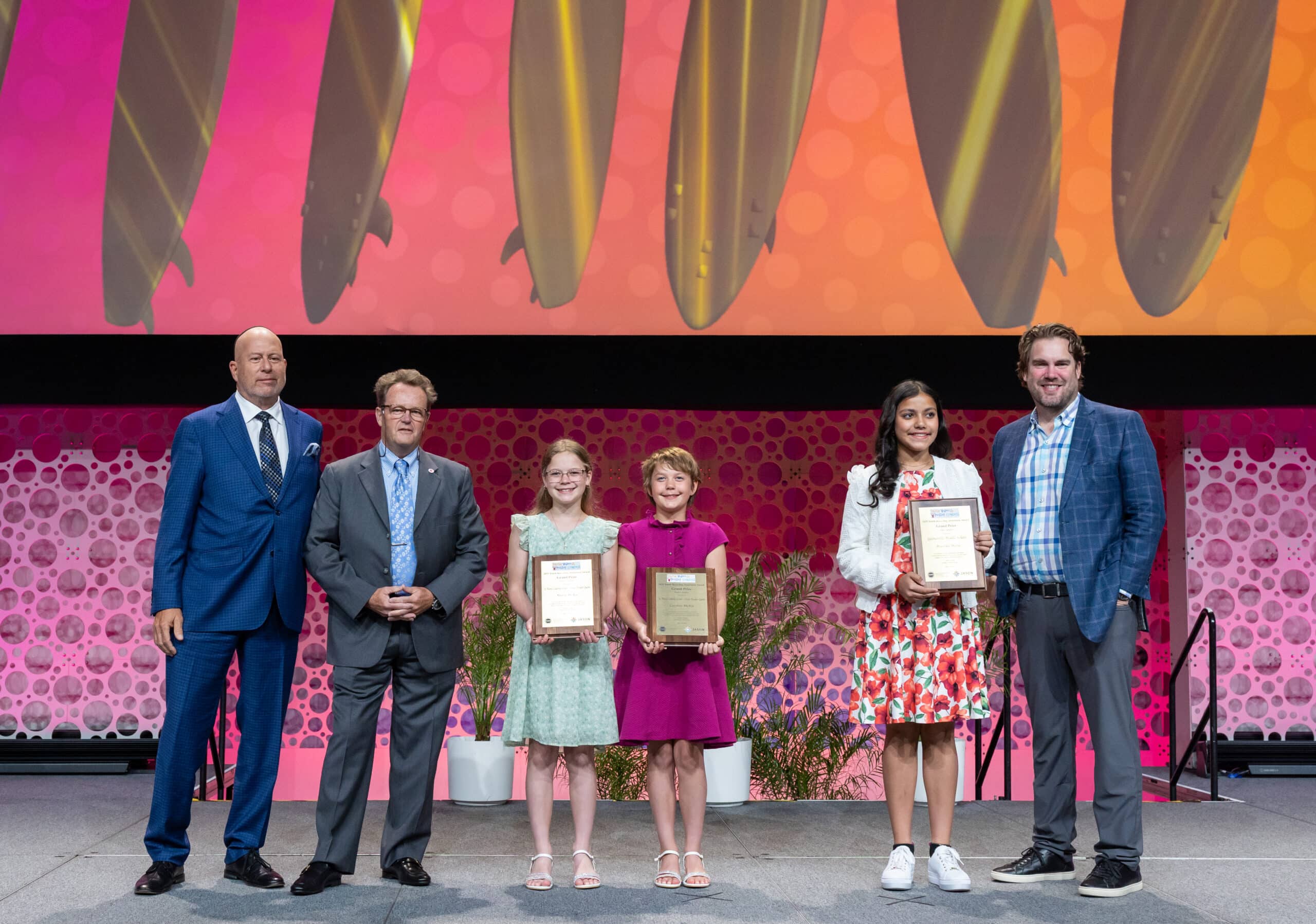 2025 JASON Learning contest winners accept their awards onstage.